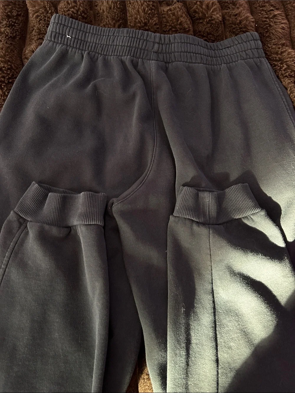 Nike Kids Black Sweatpants with White Swoosh